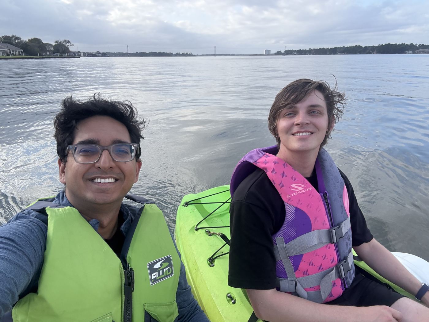 Kayaking in life vests